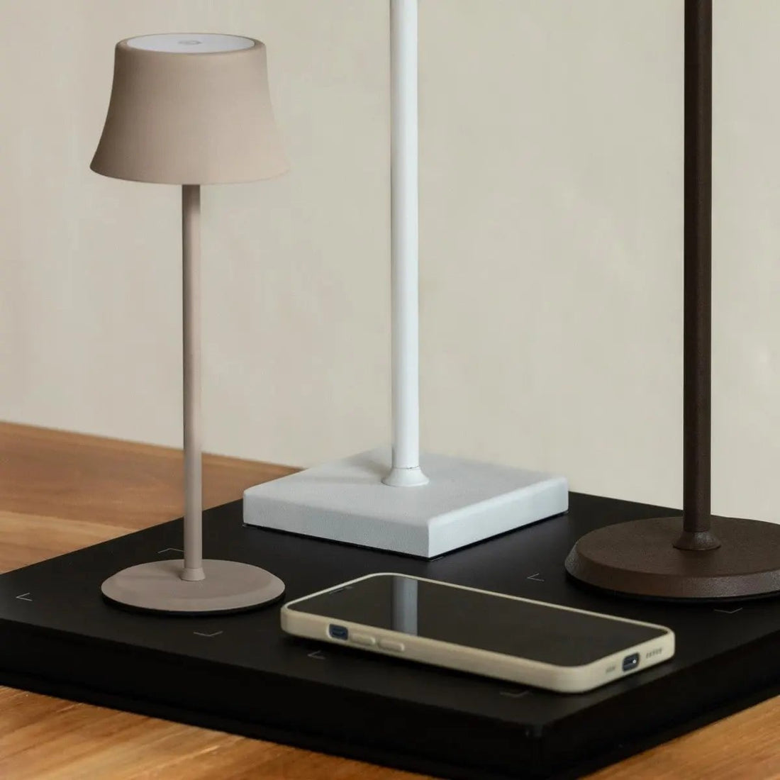 QI charging pad with phone and lamp compatability