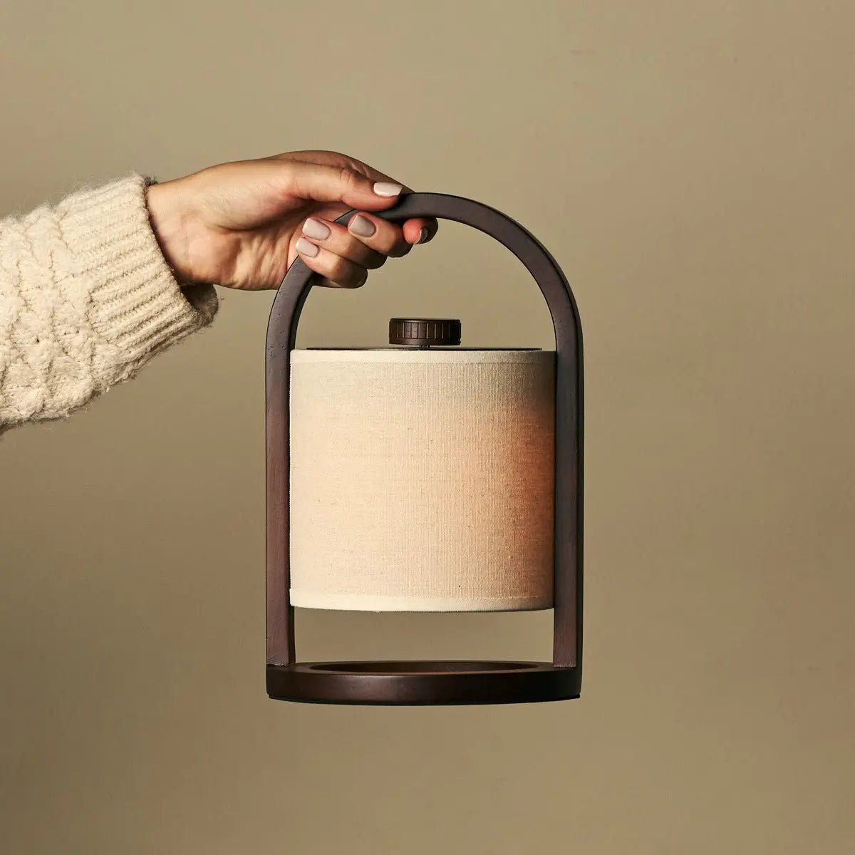Cordless table lamp placed freely in a modern interior without visible cables