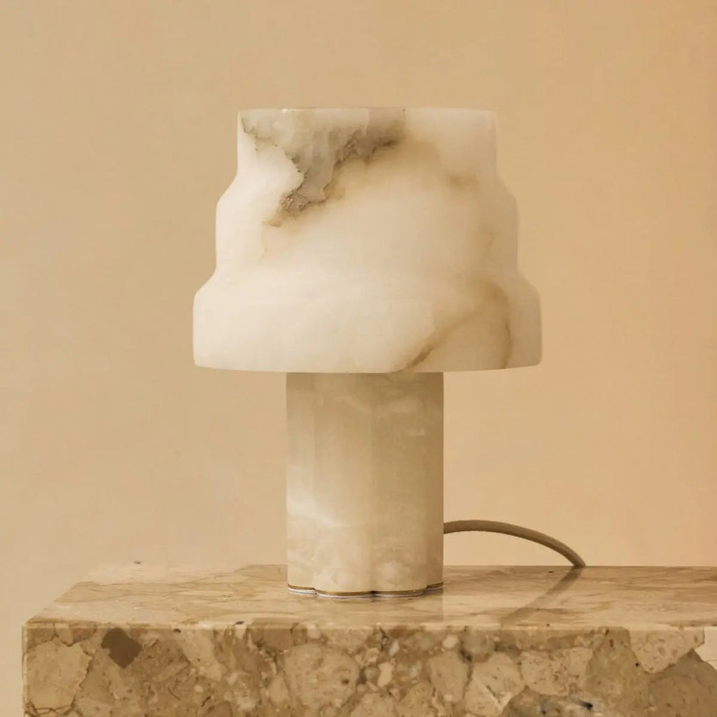 Alessandra alabaster lamp side view showing sculptural rising form