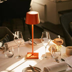 4× Wouter blossom orange rechargeable lamps with Amstel wireless charging dock