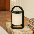 River cordless lamp side view showing black rubberwood and linen shade