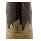 Terra ceramic vase with small bouquet on windowsill
