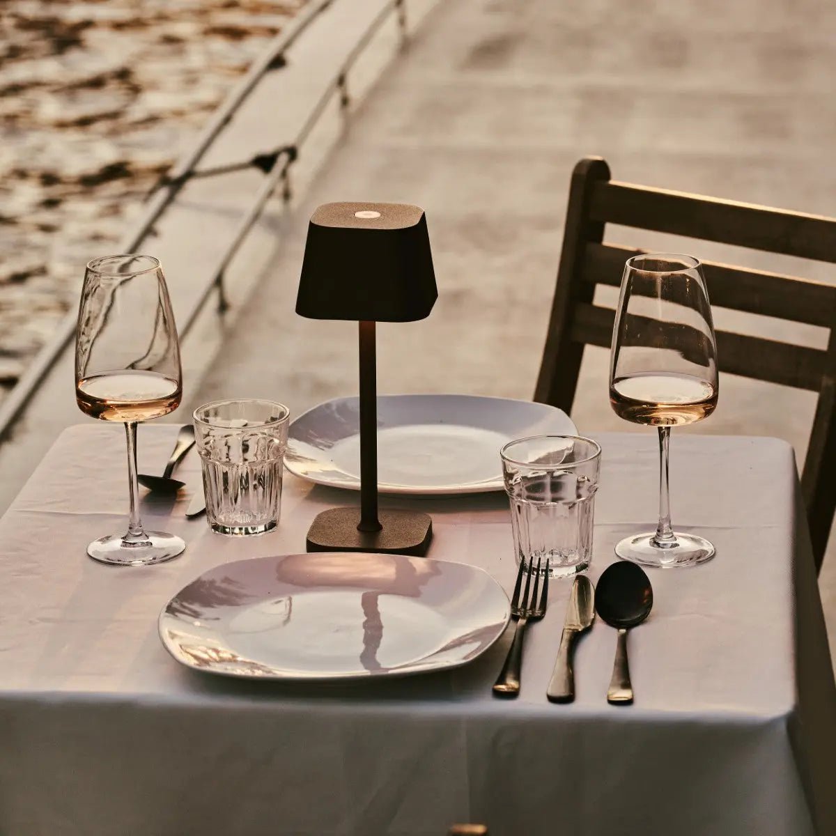 Deka rechargeable lamp warm ambient glow on bedside table