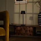 William cordless lamp on dining table in ambient light mode