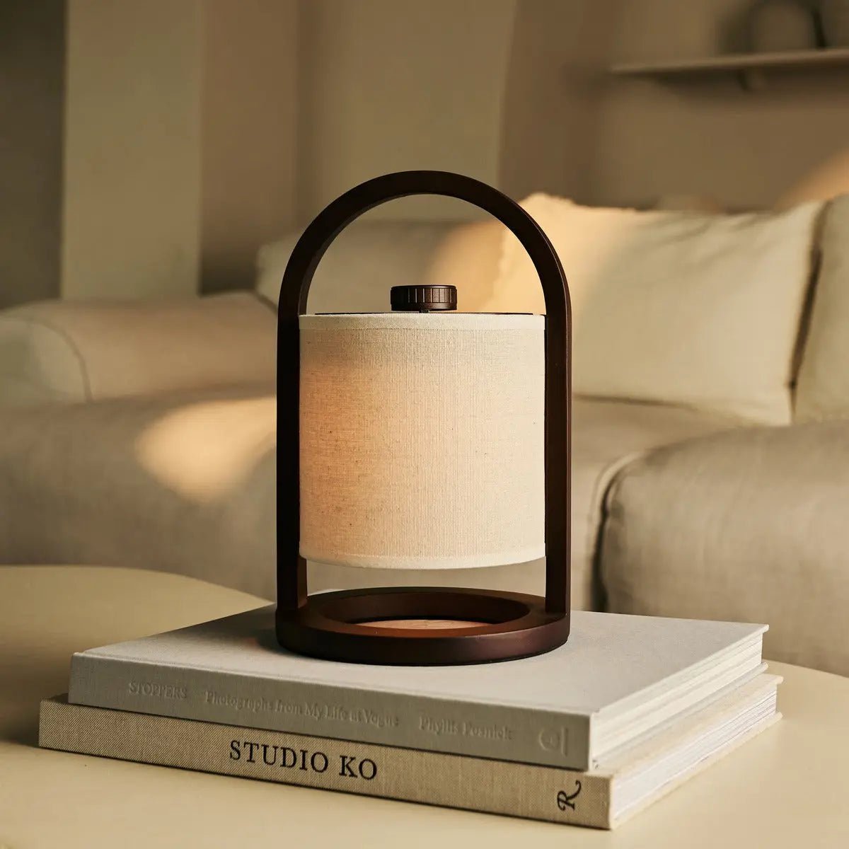 River cordless lamp side view showing rubberwood base and linen shade