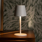 James cordless lamp on dining table in ambient light mode