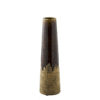 Terra brown vase on shelf as natural decorative accent