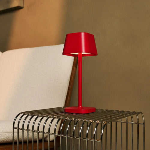 Ava metal lamp side view showing cylindrical berry red form