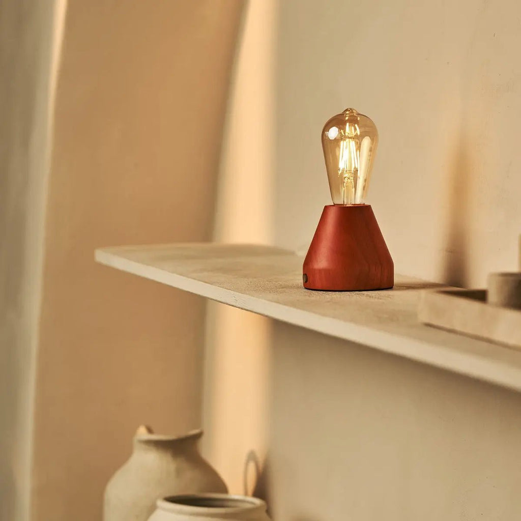 Zavi rechargeable lamp in dining table setting