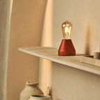 Zavi rechargeable lamp in dining table setting