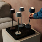 Vondel shadow grey metal lamp on hotel console table