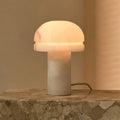 Leonardo solid alabaster corded table lamp warm translucent glow