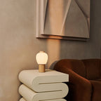 Lot table lamp warm diffused glow through matte glass