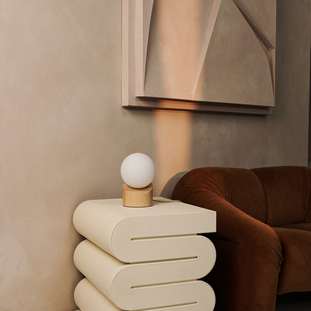 Quin table lamp warm diffused glow through matte glass