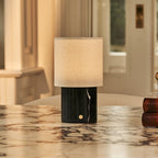 Dou rechargeable lamp in bedroom bedside setting