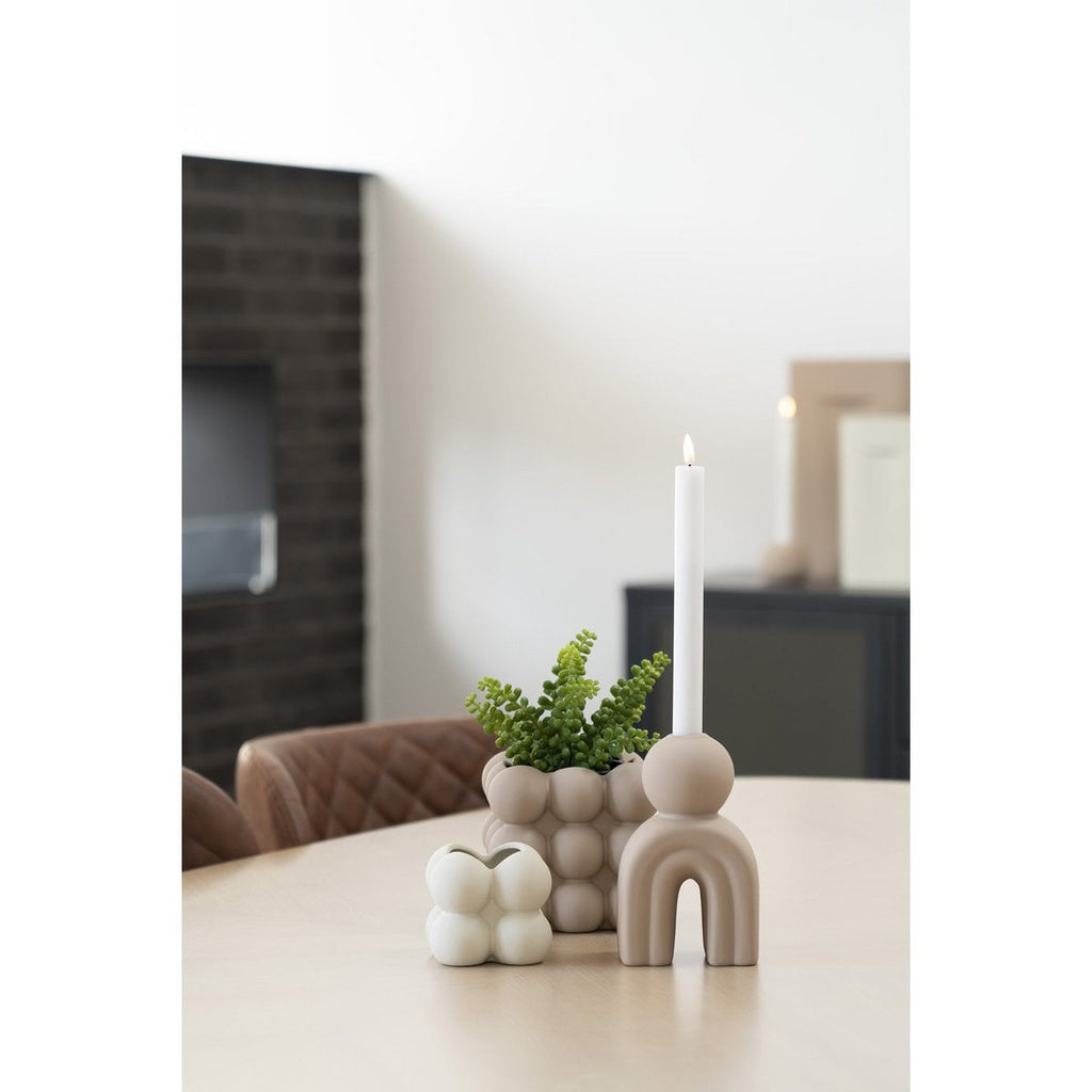 Bello brown stoneware taper candle holder curved design