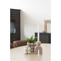 Bello brown stoneware taper candle holder curved design