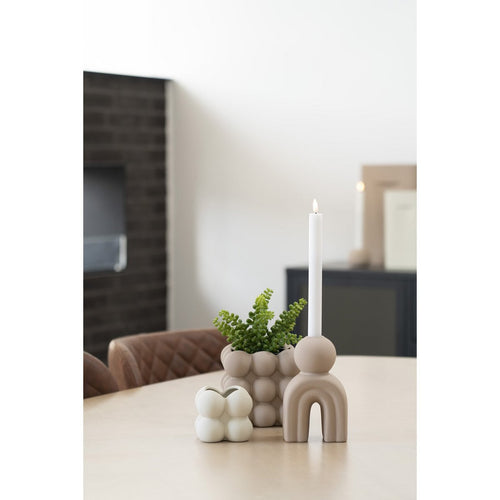 Bello brown stoneware taper candle holder curved design