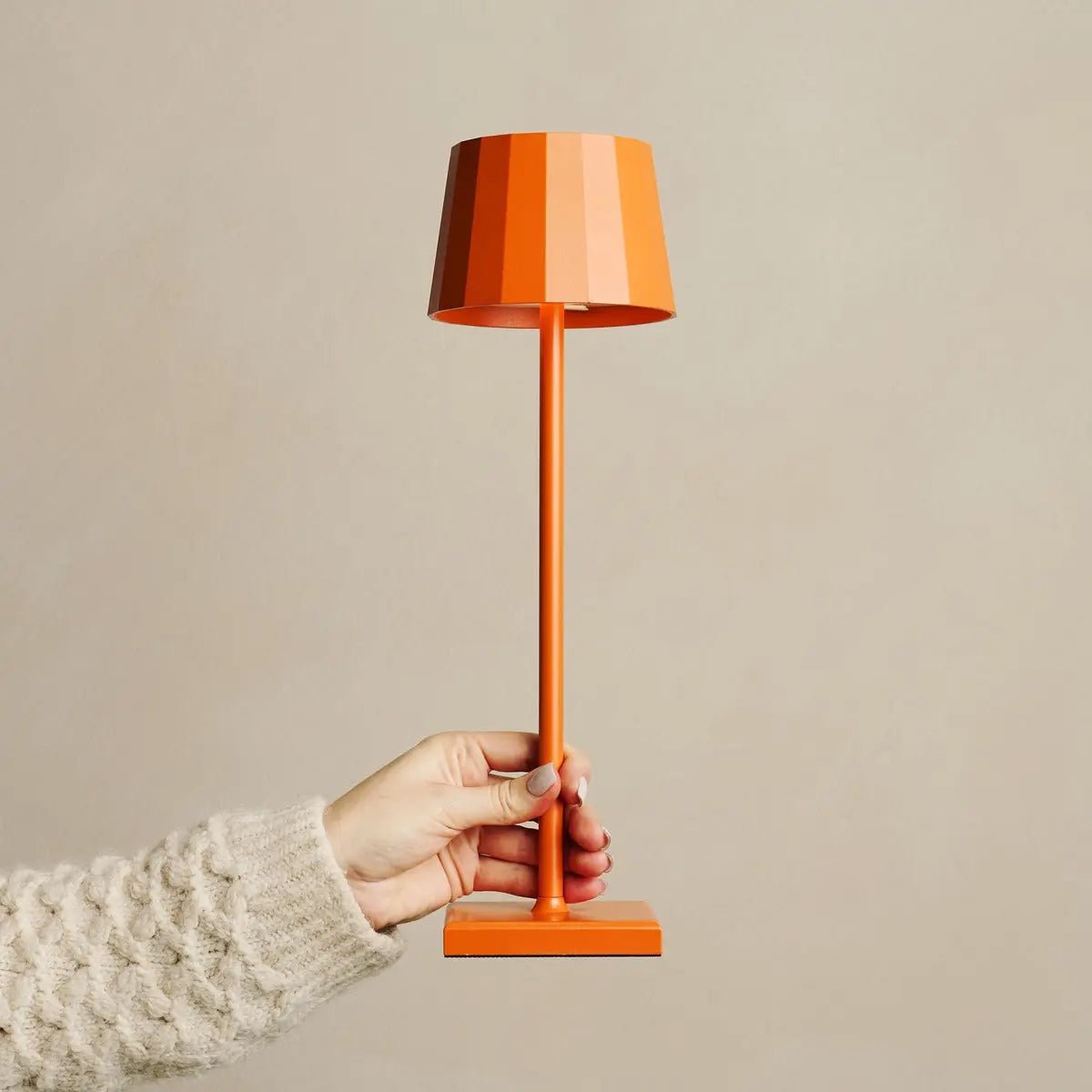 Wouter blossom orange lamp glowing on restaurant table