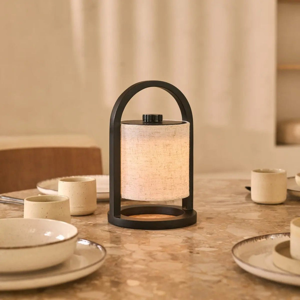 River black linen lamp on bedside table