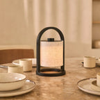 River black linen lamp on bedside table