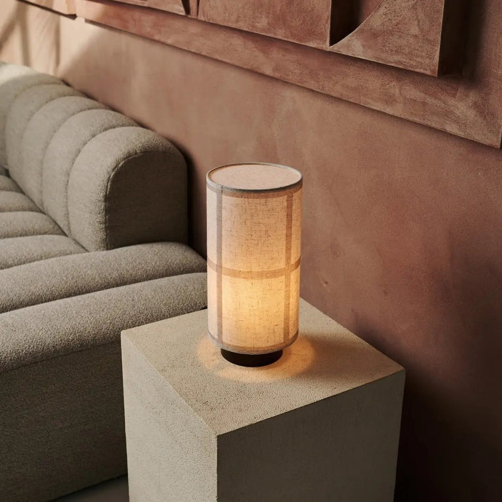 Sakura corded lamp side view showing rubberwood base and striped shade