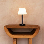 Zoe black wood lamp on outdoor terrace