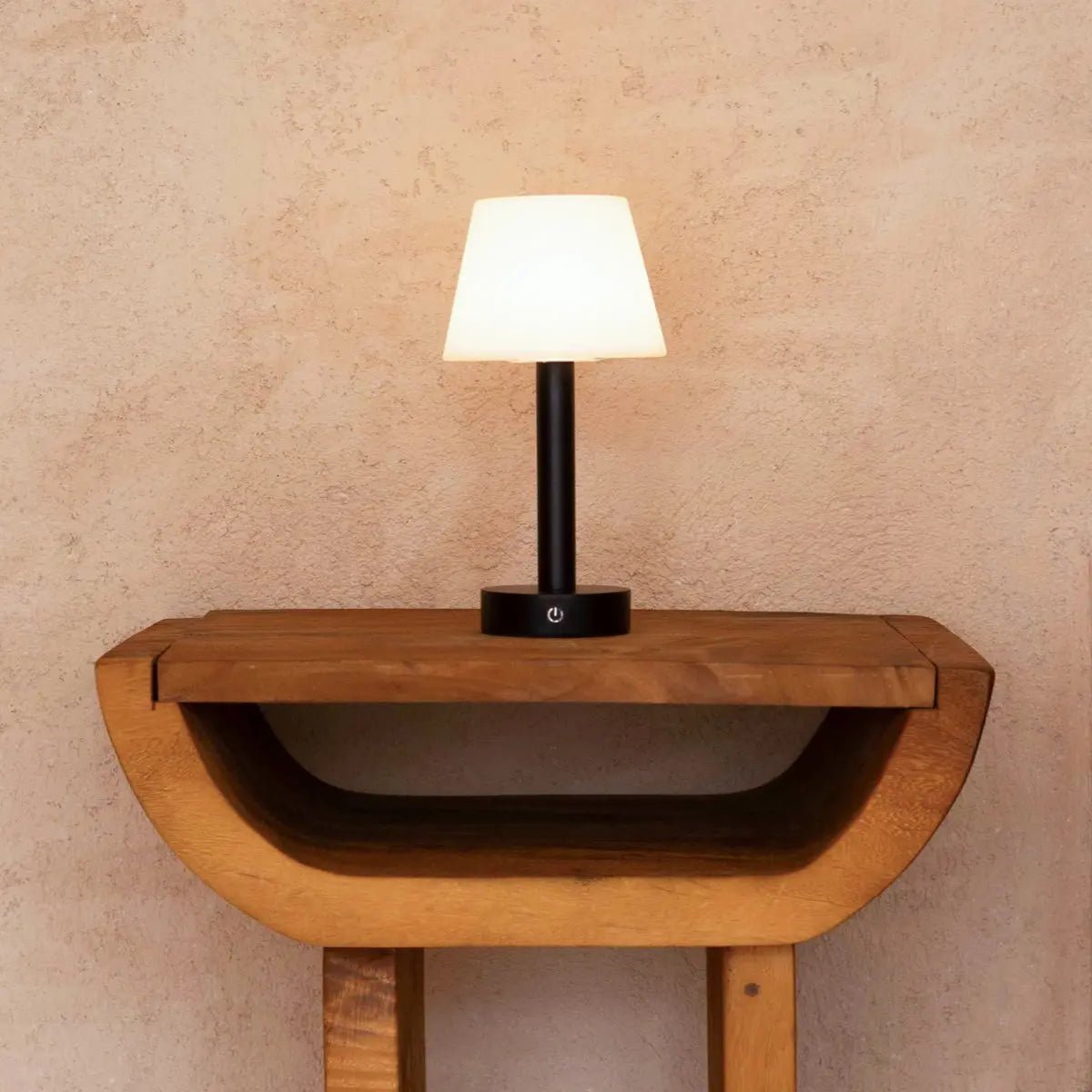 Zoe black wood lamp on outdoor terrace