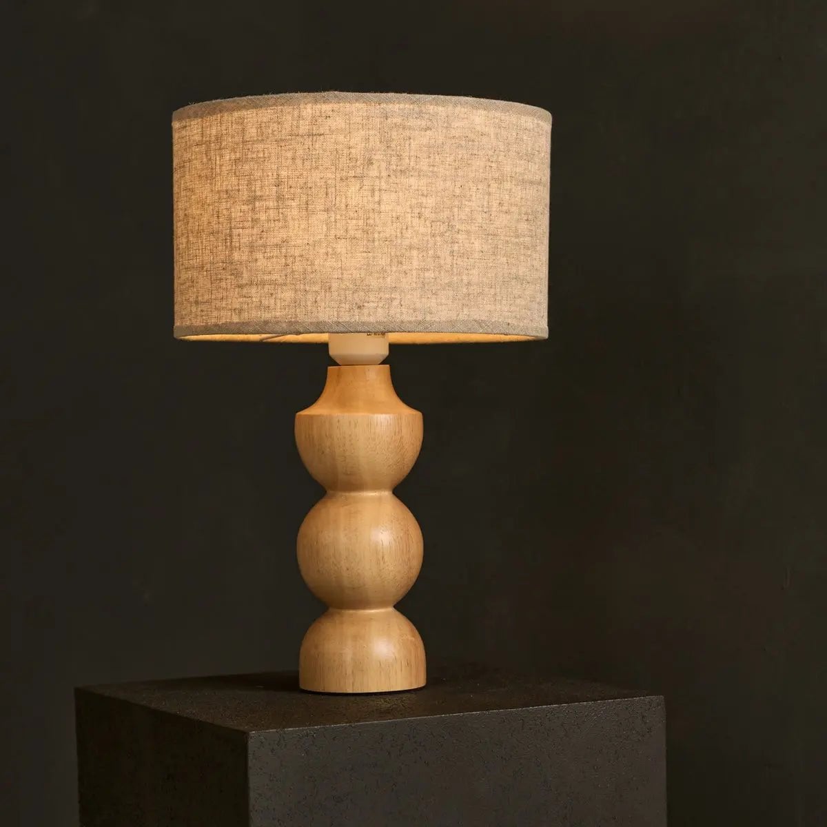 Callen light brown wood linen corded table lamp