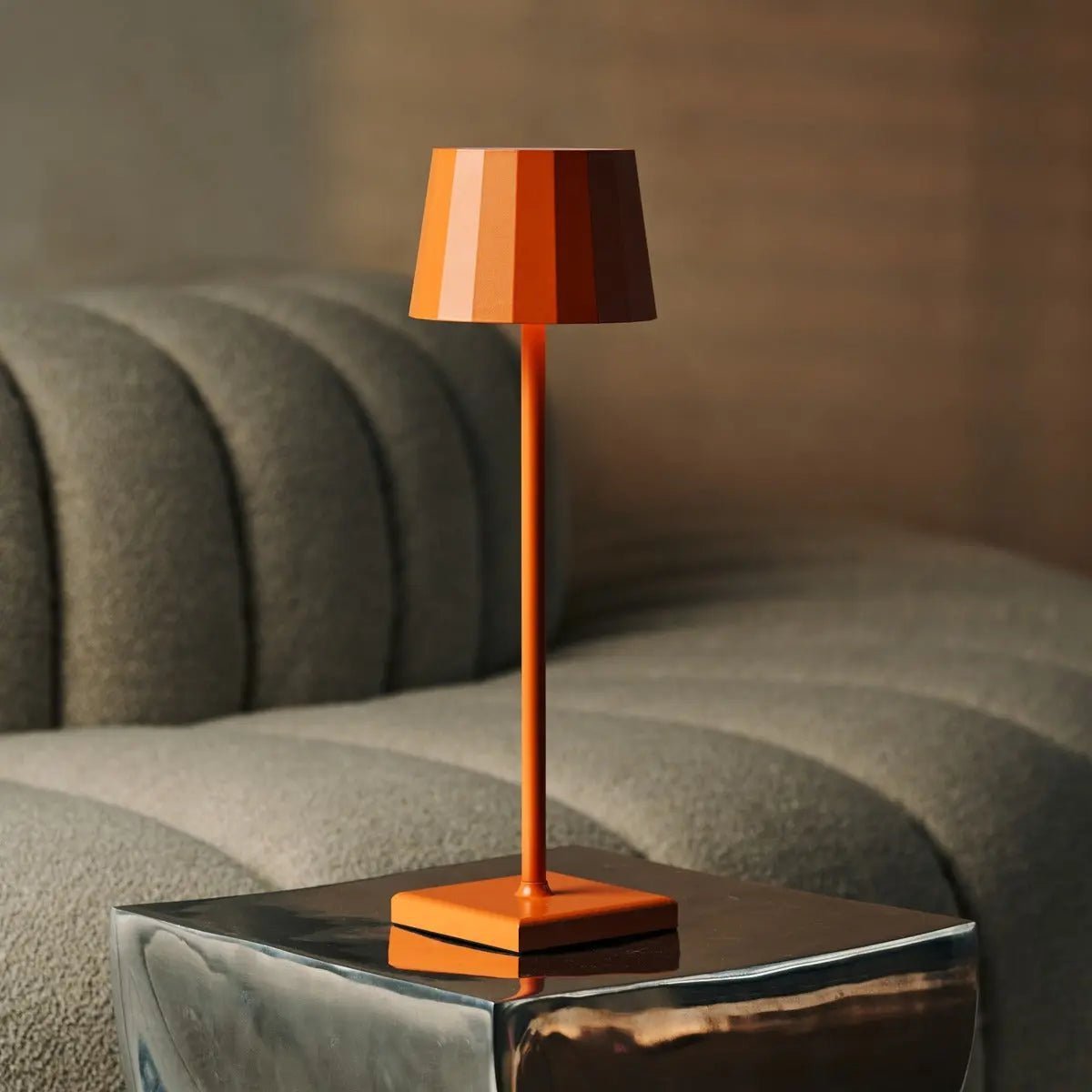 Oria metal lamp side view showing cylindrical orange blossom form
