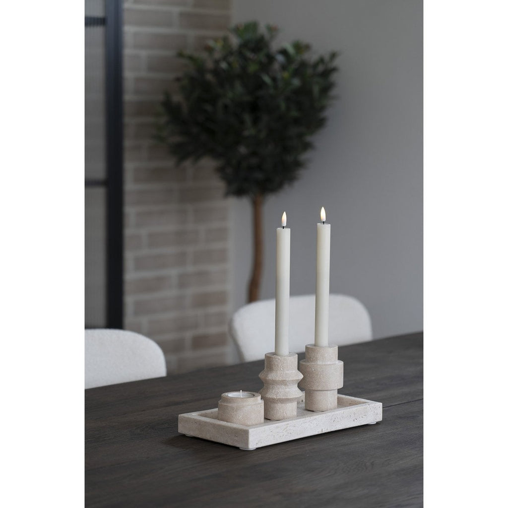 Luma travertine holders side view showing natural stone form
