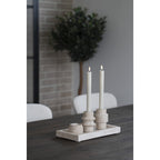 Luma travertine holders side view showing natural stone form