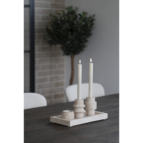 Luma travertine holders side view showing natural stone form