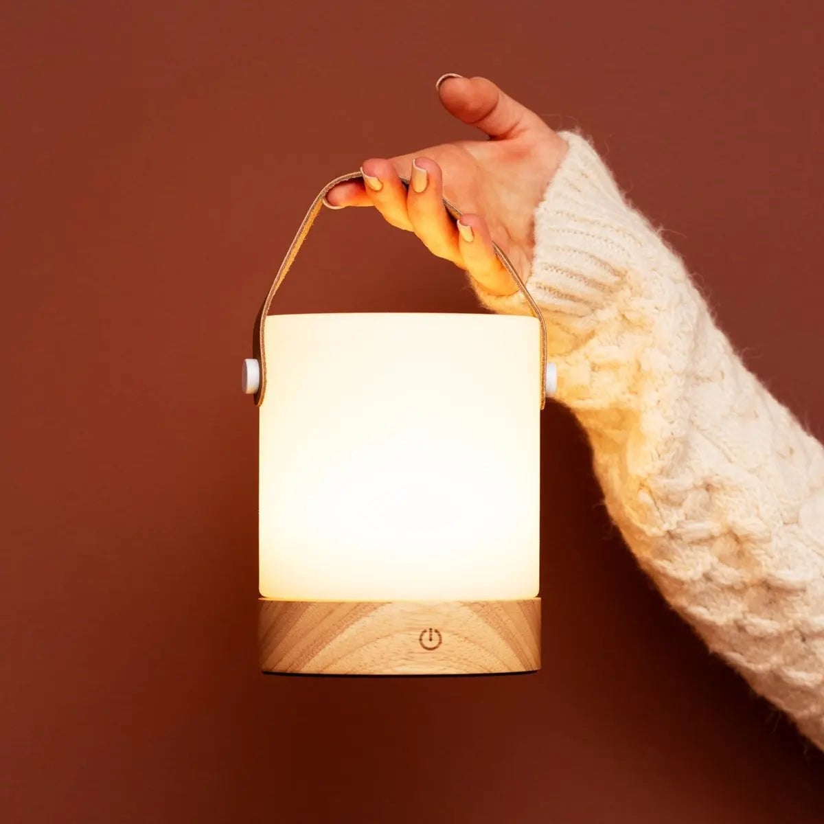 Sorin cordless lamp side view showing rubberwood base and leather detail