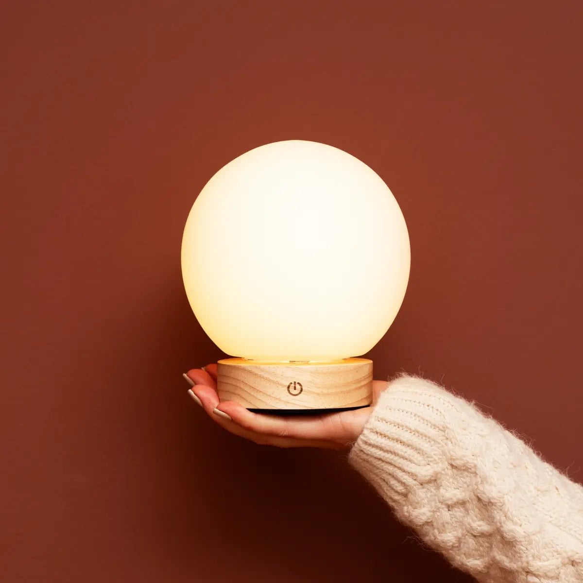 Flore compact lamp on bedside table