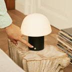 Yannick rechargeable lamp in living room console