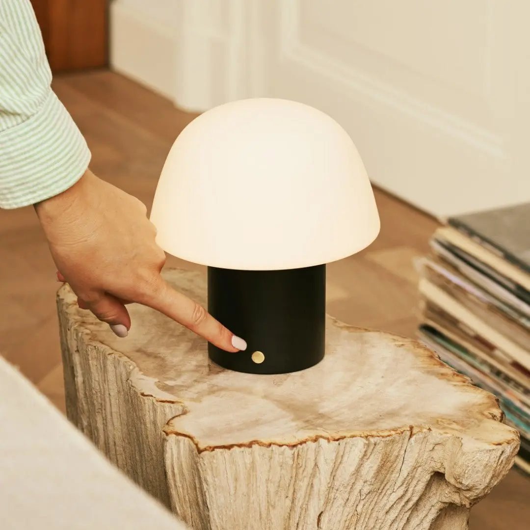 Yannick rechargeable lamp in living room console