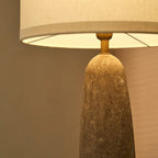 Isla travertine lamp in bedroom bedside setting