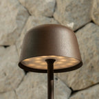 Anton rechargeable lamp warm ambient glow on bedside table