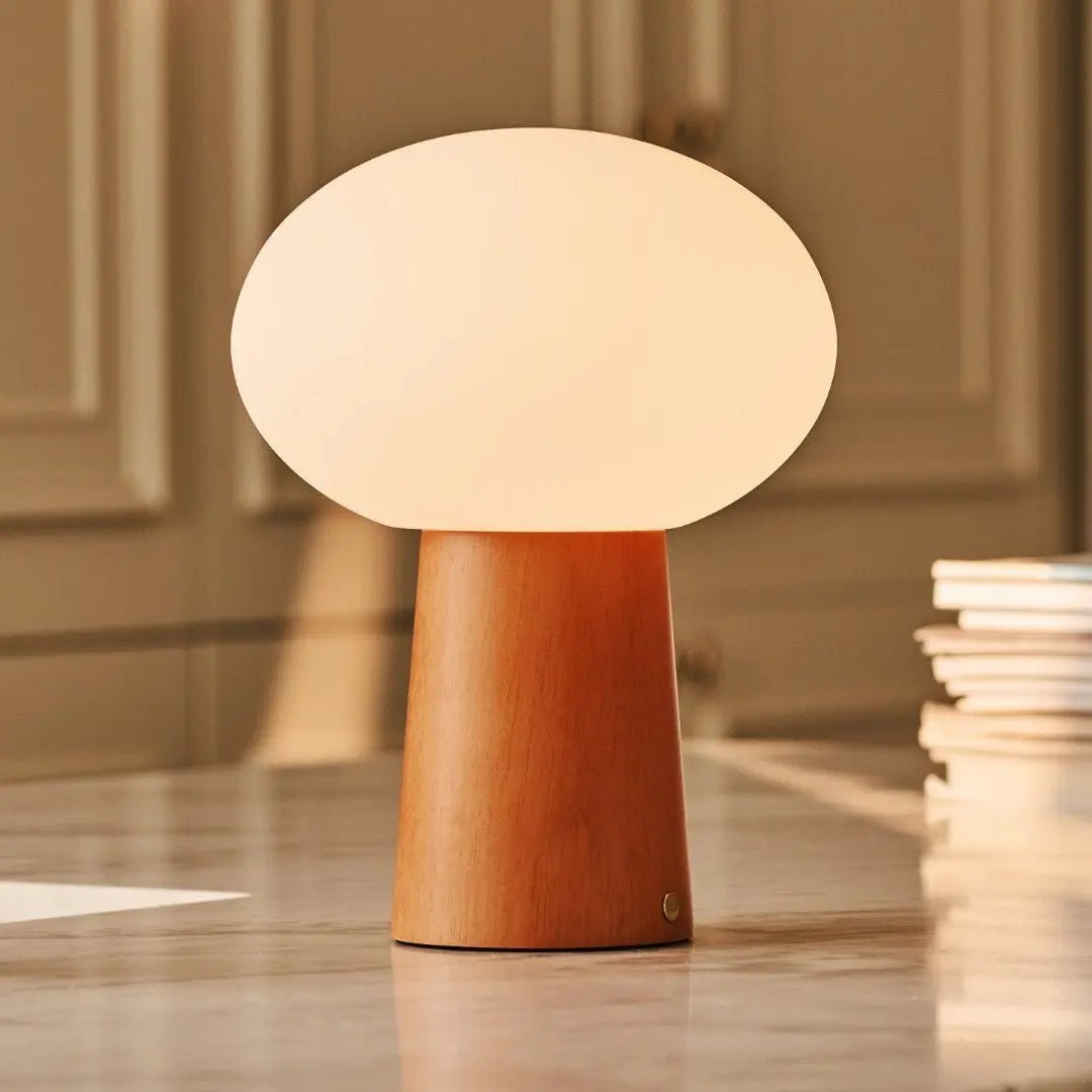 Max cordless lamp side view showing rubberwood base and rounded form