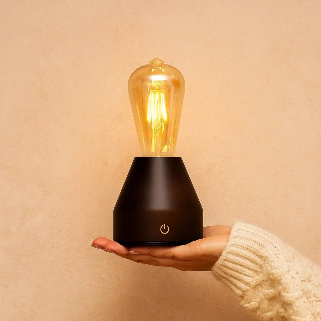 Zavi cordless lamp side view showing dark rubberwood and glass shade