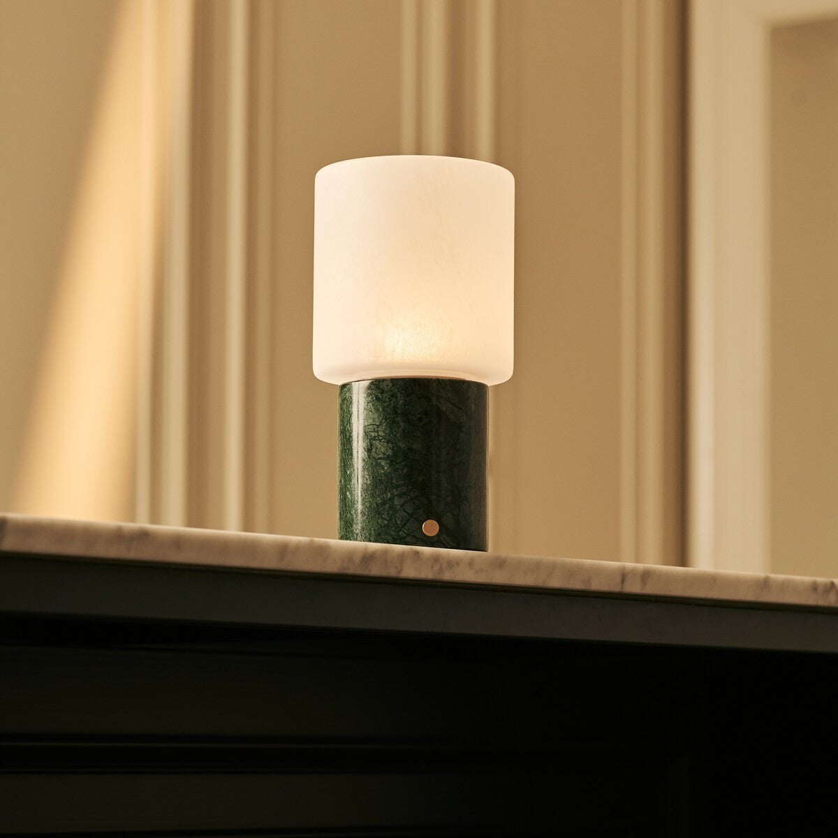Cuyp cordless lamp warm ambient glow in room setting