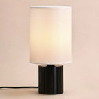 Kiko ribbed rubberwood lamp in modern interior