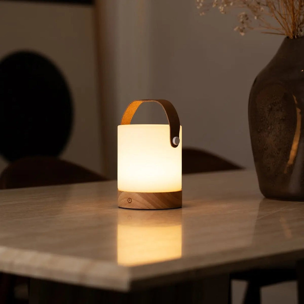 Avery wooden leather strap lamp on bedside table setting