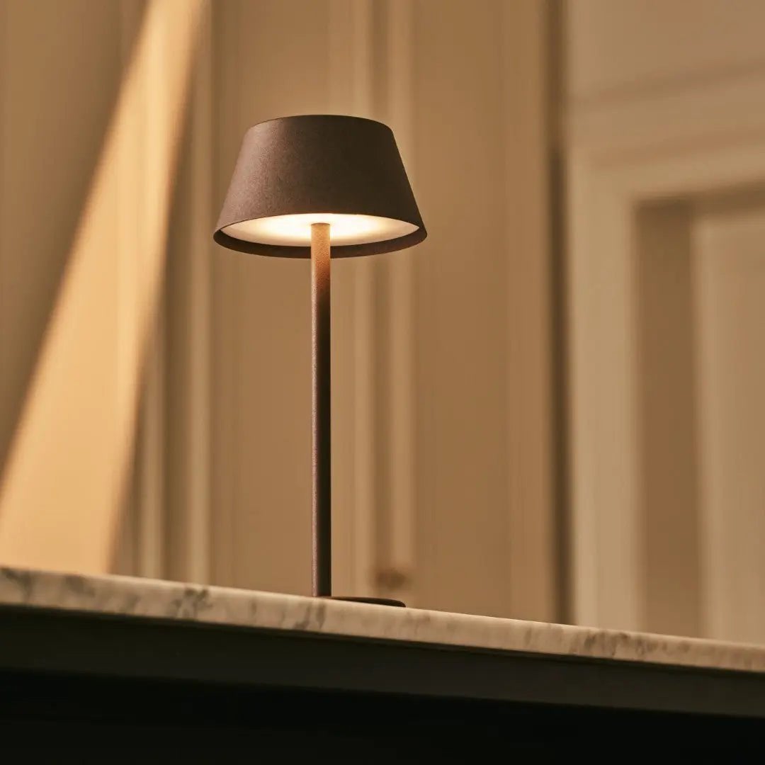 Milou rechargeable lamp in bedroom bedside setting