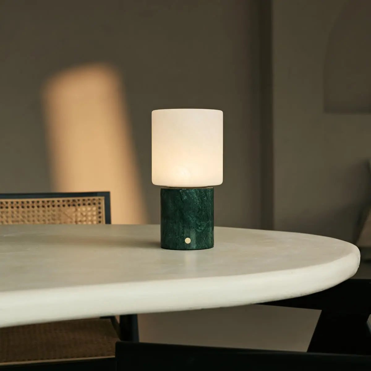 Cuyp marble lamp side view showing Verde Alpi base and glass shade