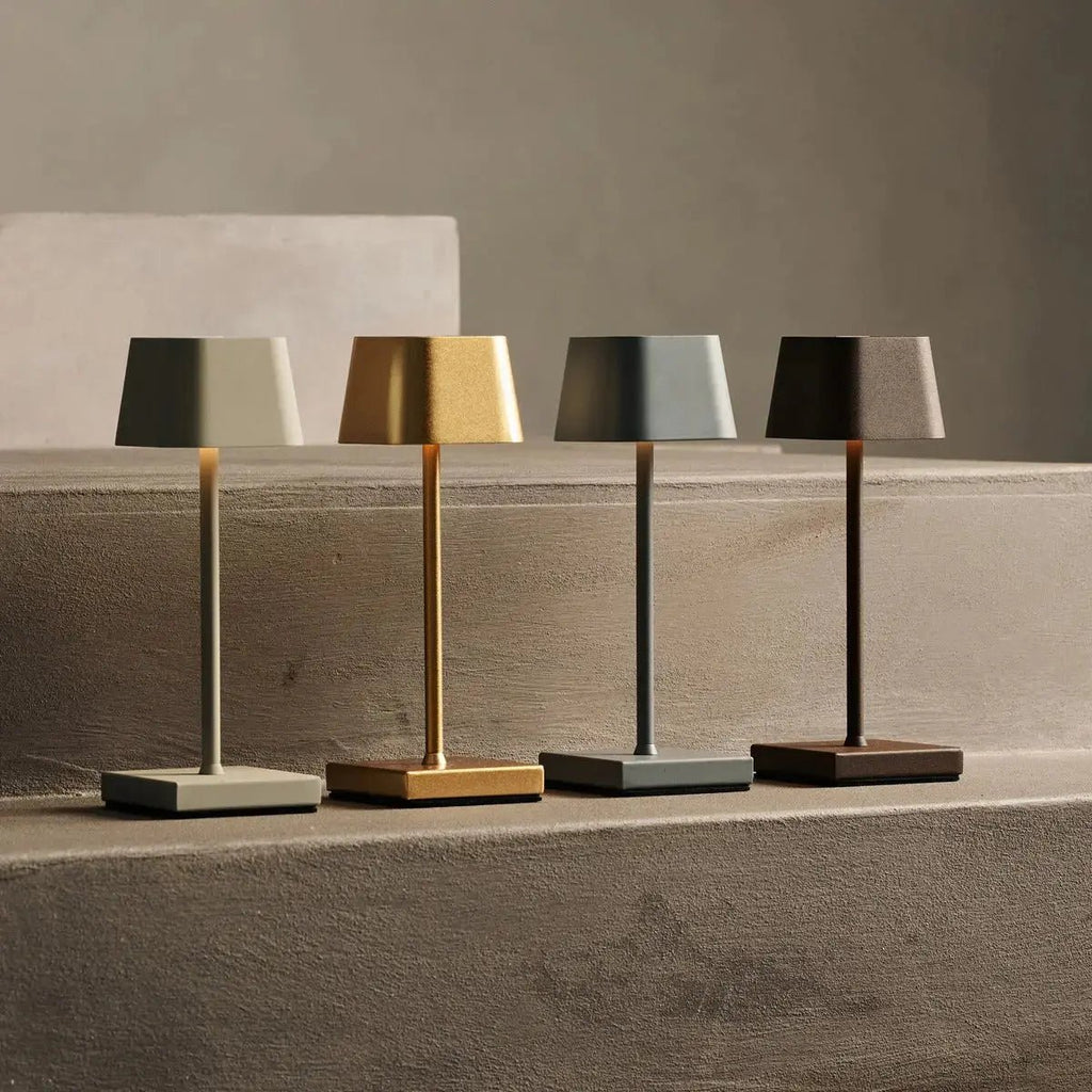 Sarphati mouse grey lamp glowing on restaurant table