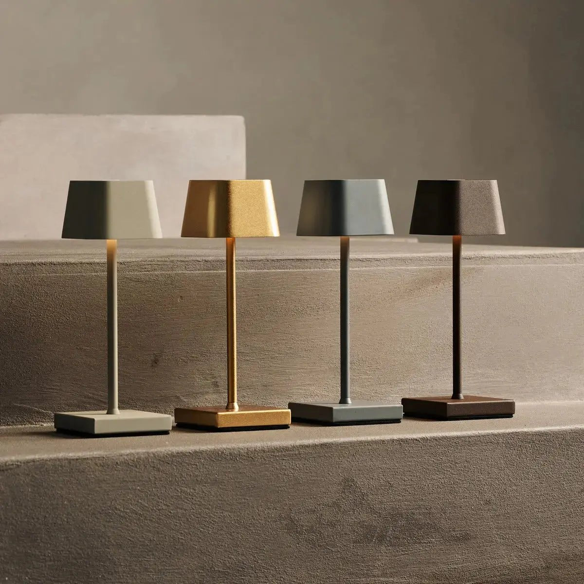 Sarphati mouse grey lamp glowing on restaurant table