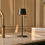 William cordless lamp overhead view cylindrical silhouette