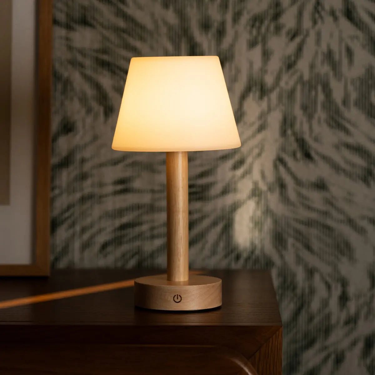 Zoe rechargeable lamp in living room console